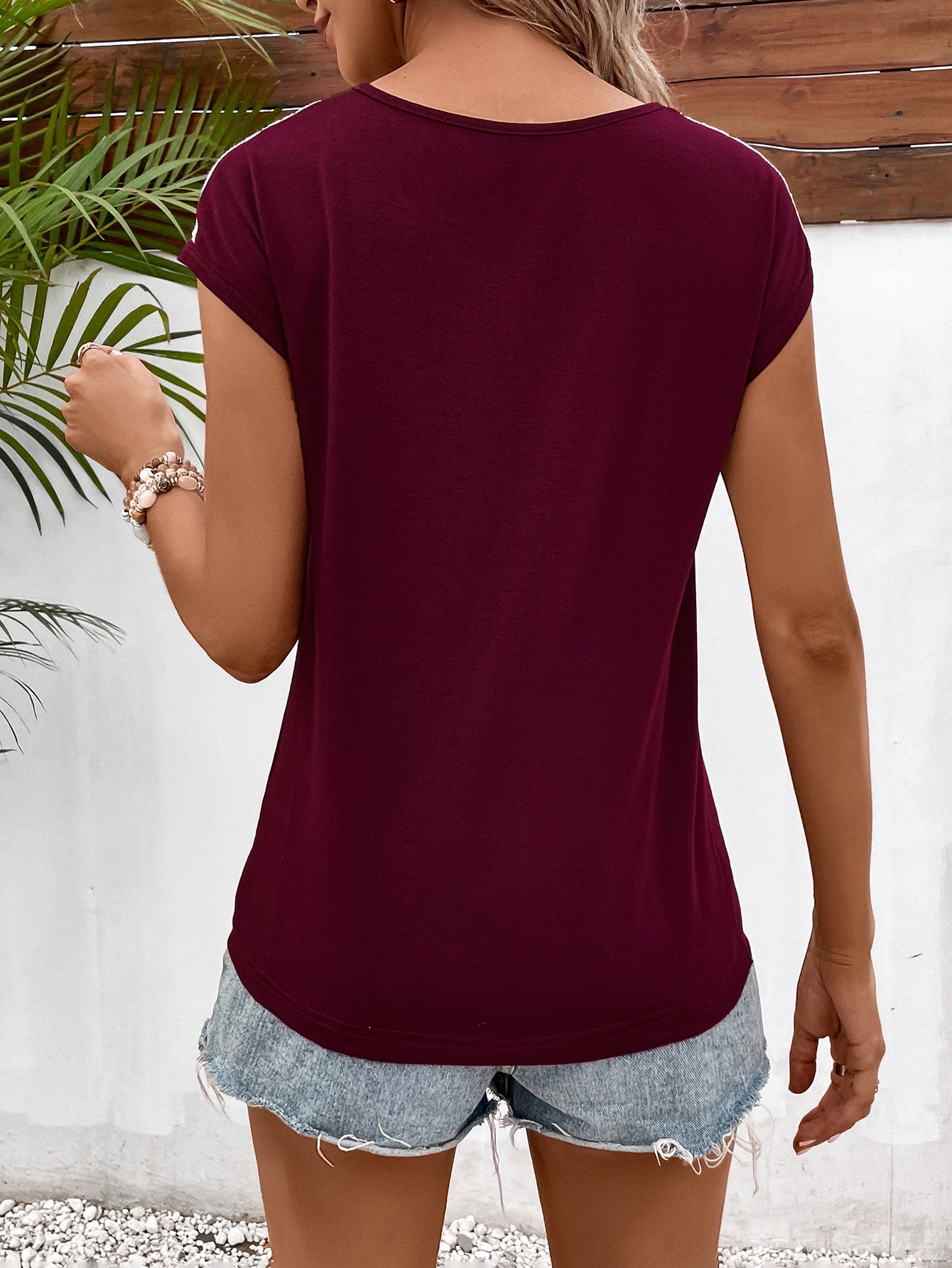 Ivy Lane Spliced Lace V-Neck Twisted Hem Tee - Trendsi | Lola Mariee