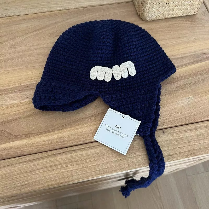 Handmade Knitted Earflap Hat with Tassels – view 5 | Lola Mariee